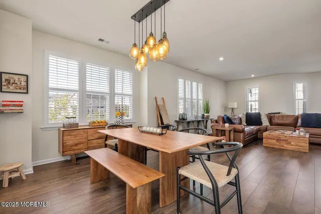 a room with furniture and a large window