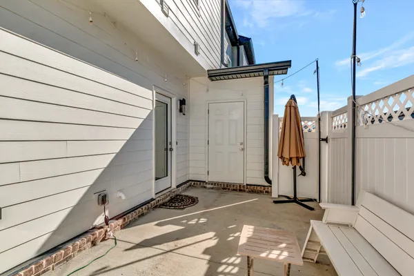 a view of a house with large windows