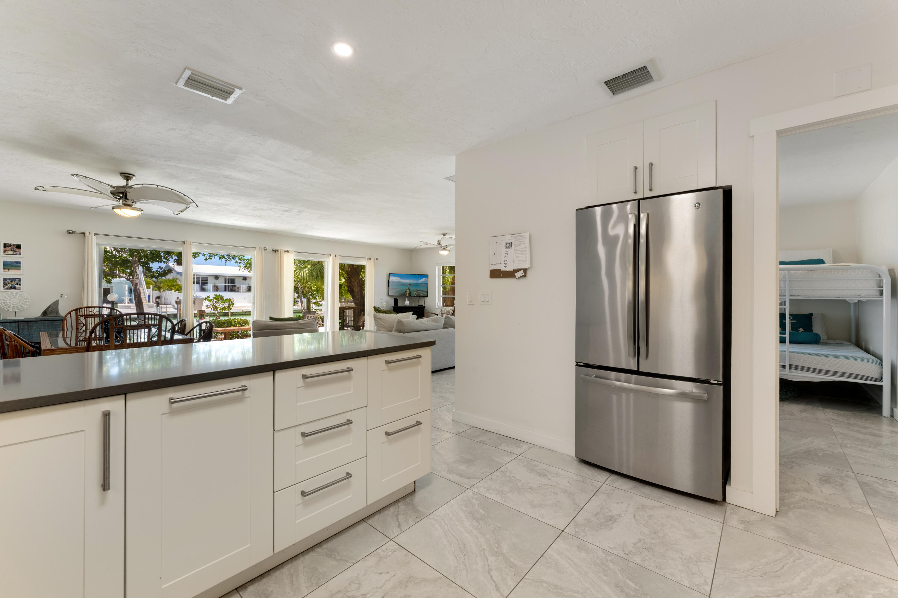 440 9th Street Key Colony Beach, FL 33051 - Photo 14 of 50 Kitchen - Open Dining & Living