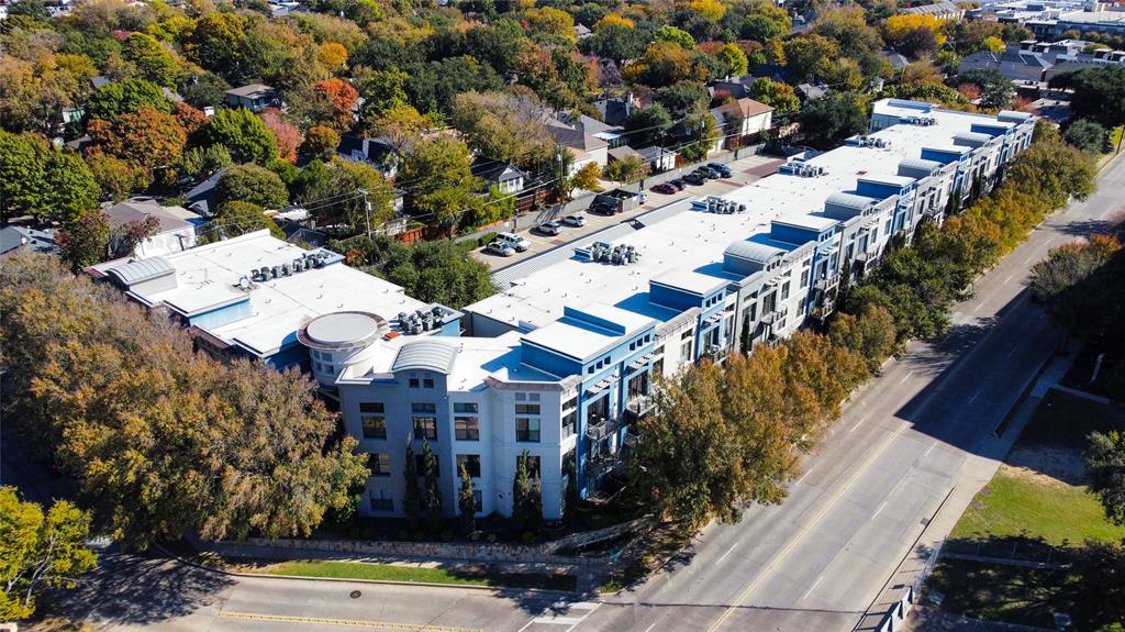 4414 Cedar Springs Road, Unit 214 Dallas, TX 75219 - Photo 27 of 29 a view of a city with lots of trees