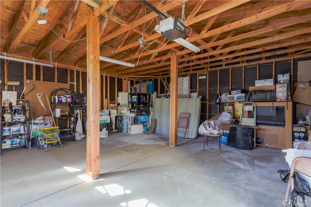 29520 Piani Road Pearblossom, CA 93553 - Photo 10 of 34 a view of a storage room with racks