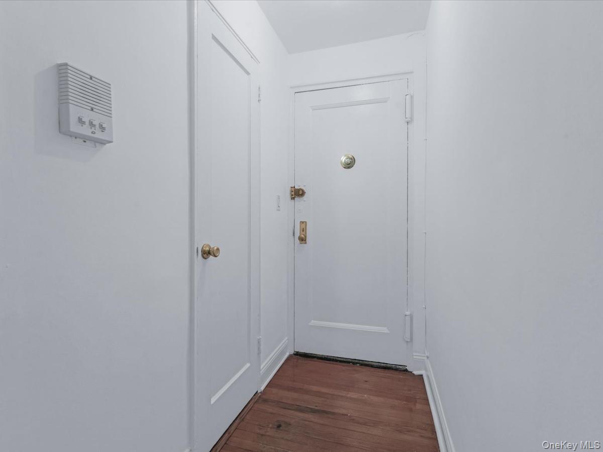 102-55 67th Road, Unit 4W Queens, NY 11375 - Photo 3 of 17 Doorway to outside with wood finished floors
