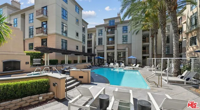 a view of pool with outdoor seating