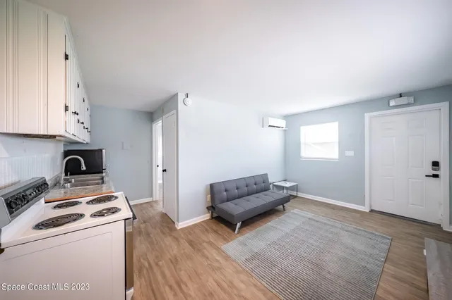 a view of kitchen and sink