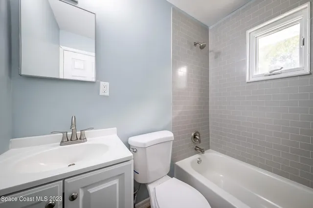 a kitchen with stainless steel appliances granite countertop refrigerator sink and cabinets