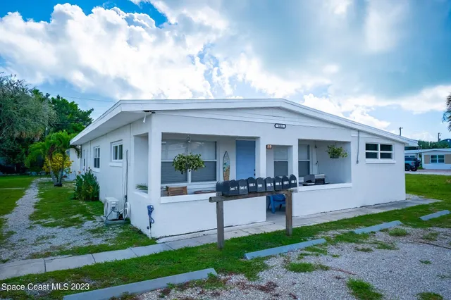 a view of a yard with an outdoor space