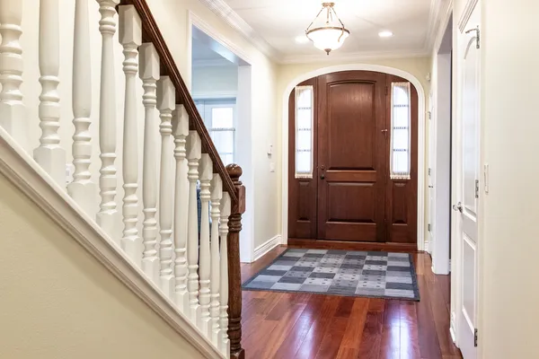 a view of front door with stairs