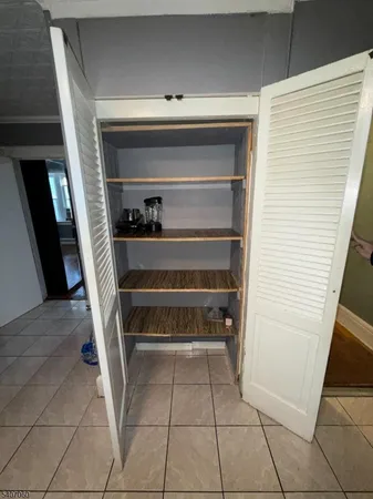 a storage room with washer and dryer