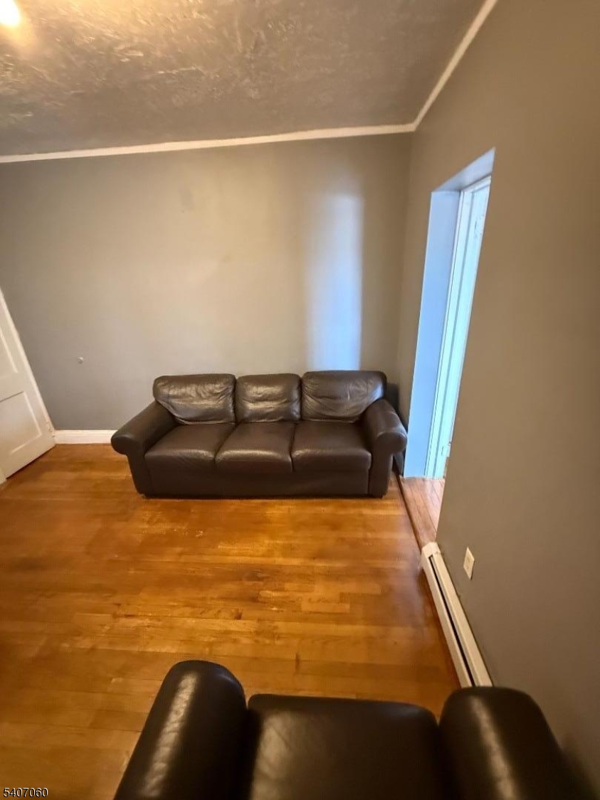 243 Lake Street Newark, NJ 07104 - Photo 7 of 16 a bathroom with a sink and tub