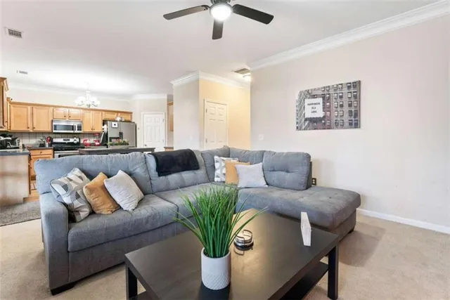 a kitchen with stainless steel appliances a sink stove and refrigerator