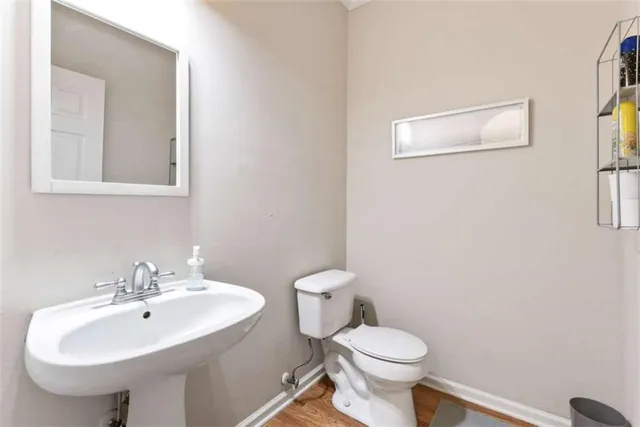 a view of a hallway with a white door