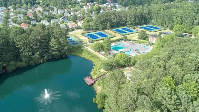 a view of a swimming pool with a garden