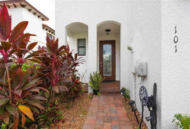 a view of entryway with wooden floor