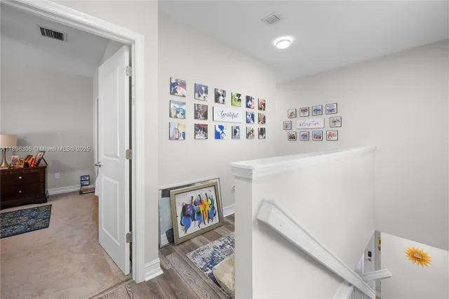 a view of a hallway with entryway