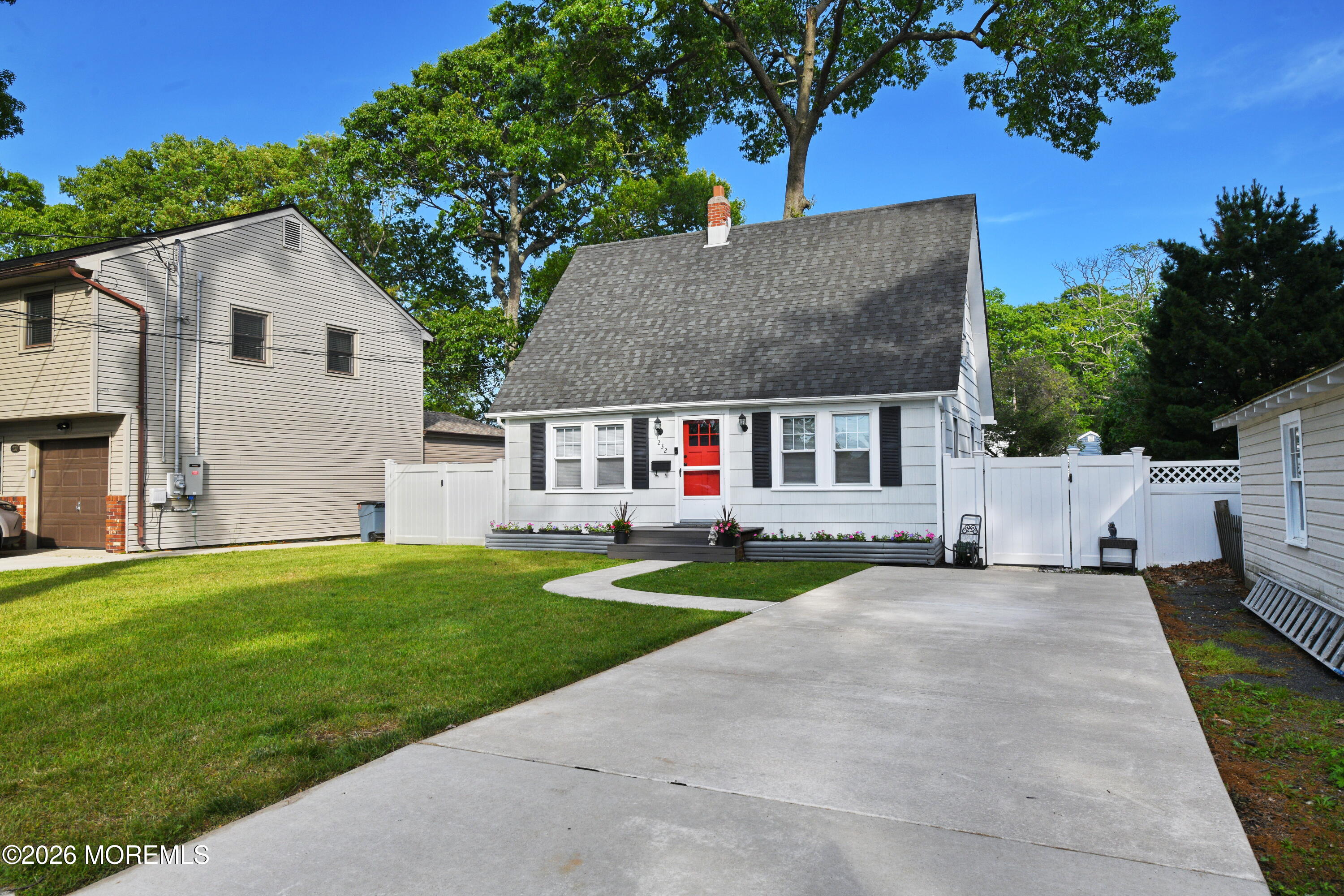232 Pearce Avenue Point Pleasant, NJ 08742 - Photo 2 of 27 a front view of house with yard and green space