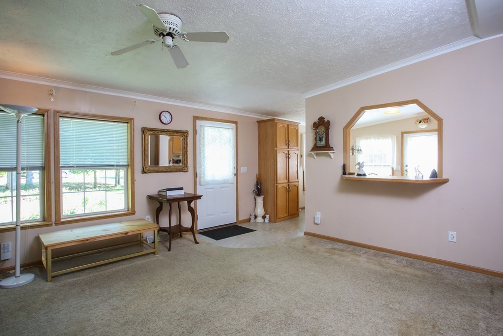 169 Ford Hill Road Rowe, MA 01367 - Photo 11 of 24 a living room with furniture and a window