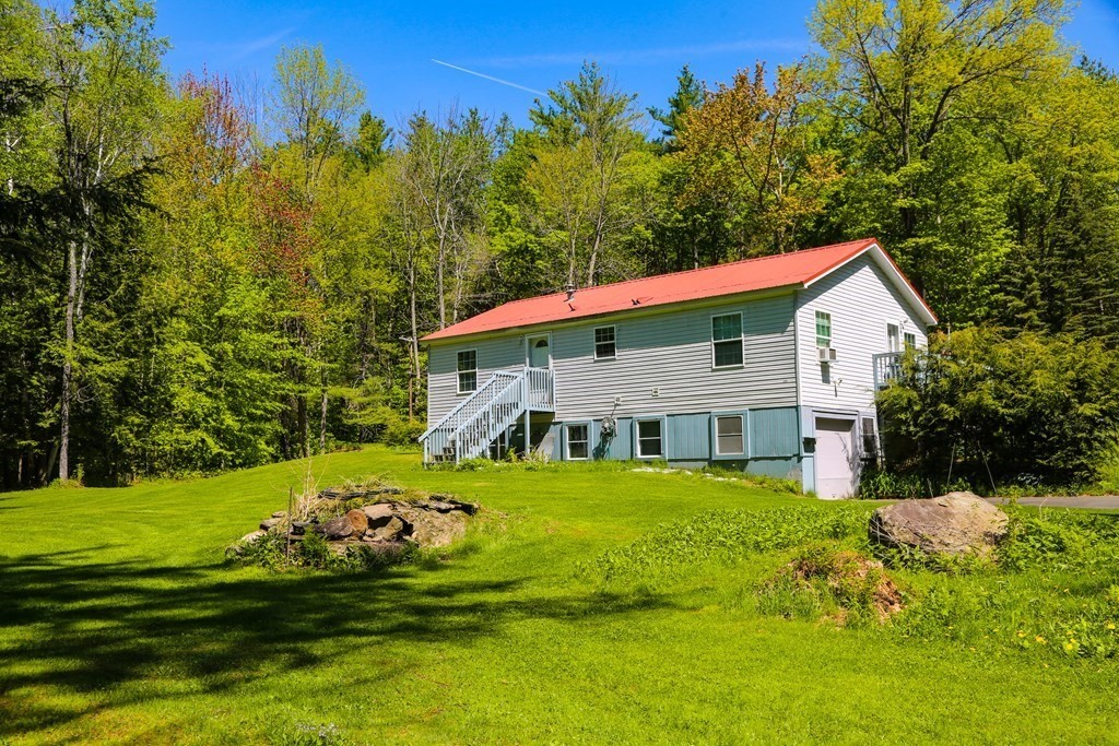169 Ford Hill Road Rowe, MA 01367 - Photo 23 of 24 a view of a house with a yard