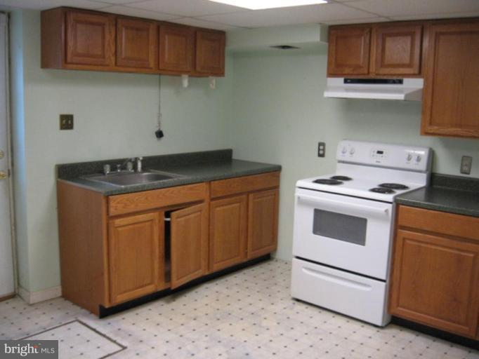 78 Friendship Road Friendship, MD 20758 - Photo 10 of 13 bsmt kitchen