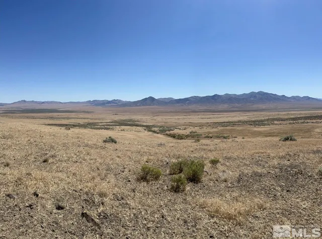 a view of an outdoor space with mountain view