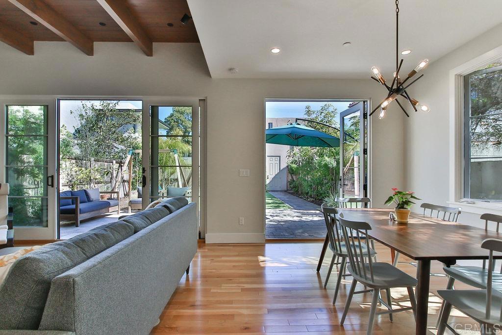 573 H Coronado, CA 92118 - Photo 14 of 39 a view of a dining room with furniture window and outside view