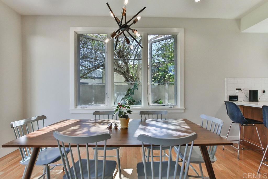 573 H Coronado, CA 92118 - Photo 15 of 39 a view of a dining room with furniture window and outside view