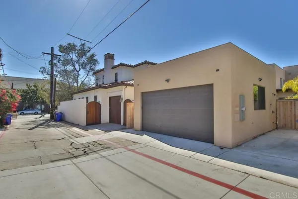 a front view of a house with a garage