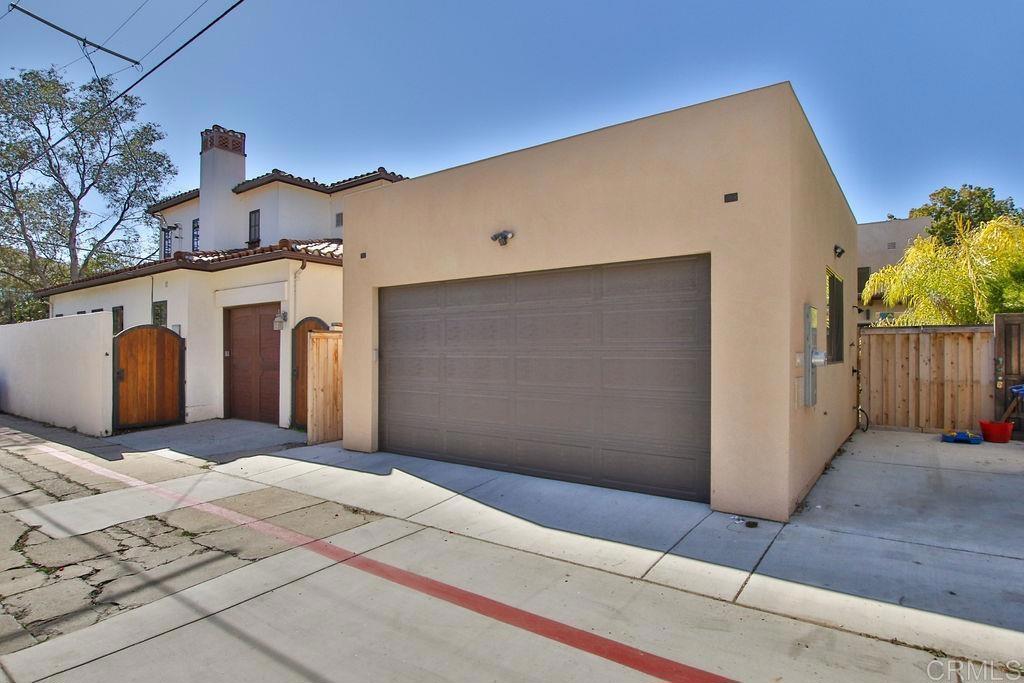 573 H Coronado, CA 92118 - Photo 39 of 39 a view of a house with a yard