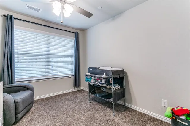 a view of a workspace with furniture