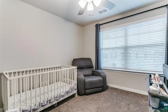 a view of a workspace with furniture