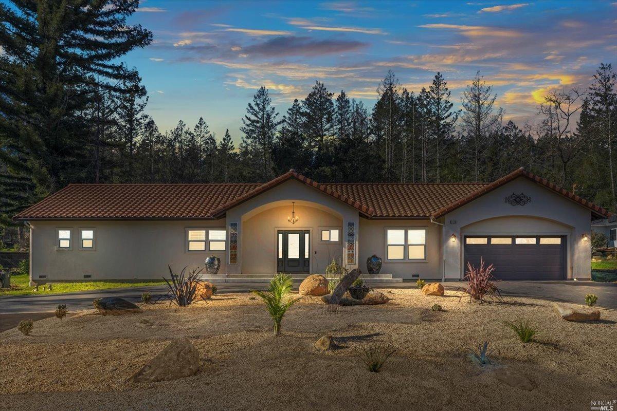 3439 Deer Trail Road Santa Rosa, CA 95404 - Photo 1 of 1 a view of a house with a patio and a yard