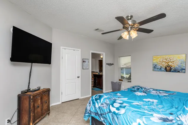 a bathroom with a tub and a shower