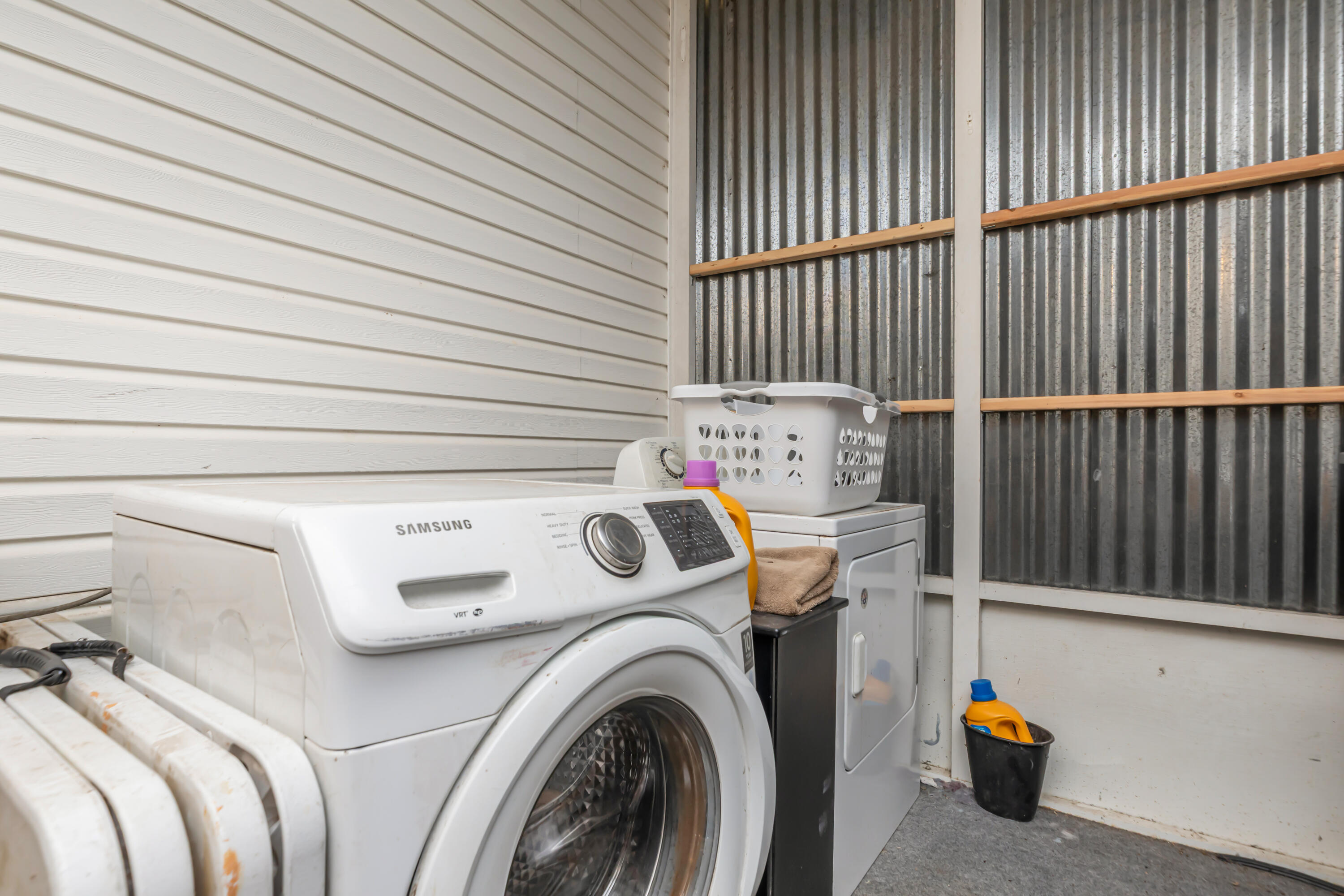 7478 Rose Street Navarre, FL 32566 - Photo 45 of 60 a utility room with dryer and washer