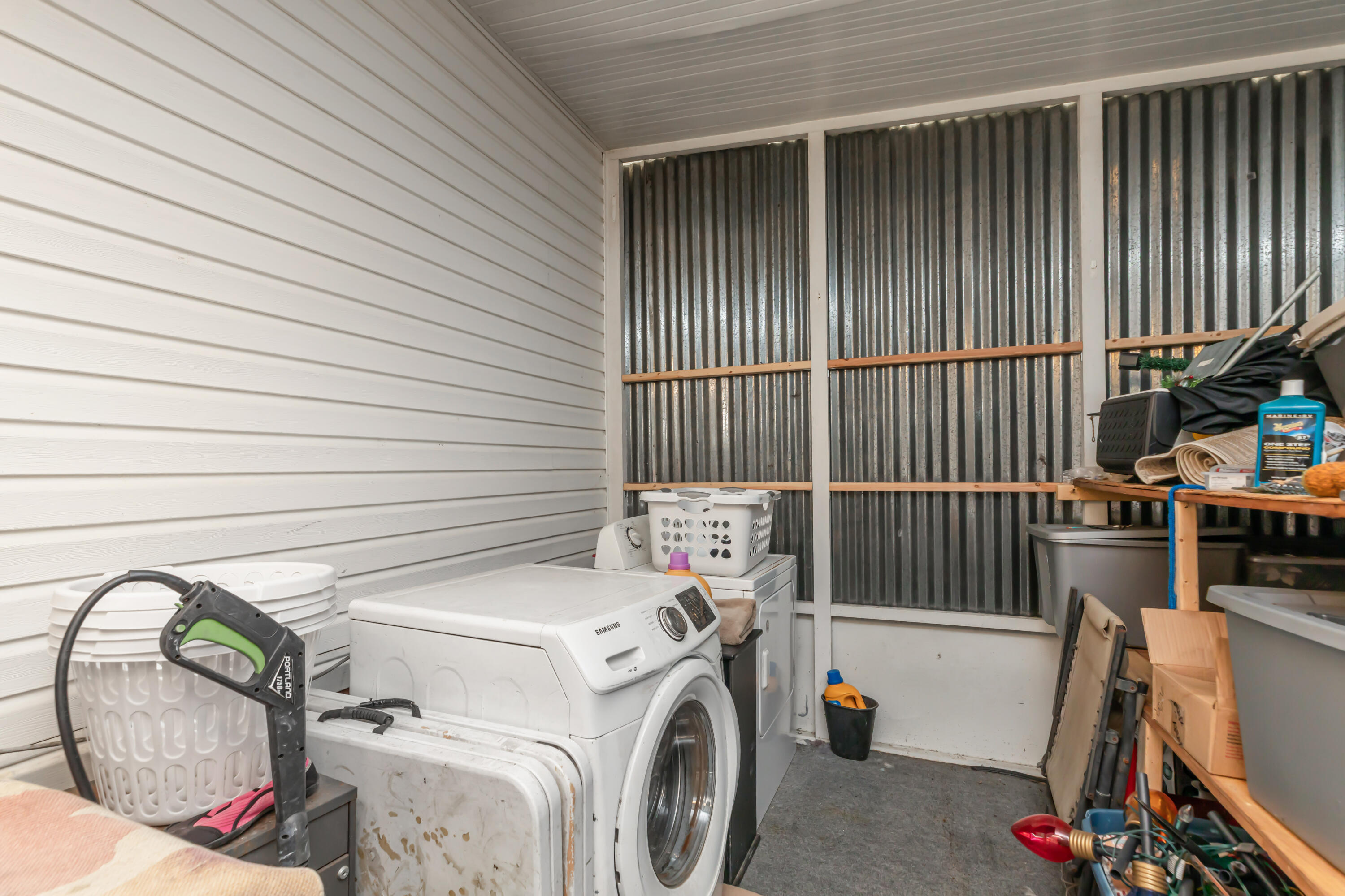 7478 Rose Street Navarre, FL 32566 - Photo 46 of 60 a utility room with dryer and washer