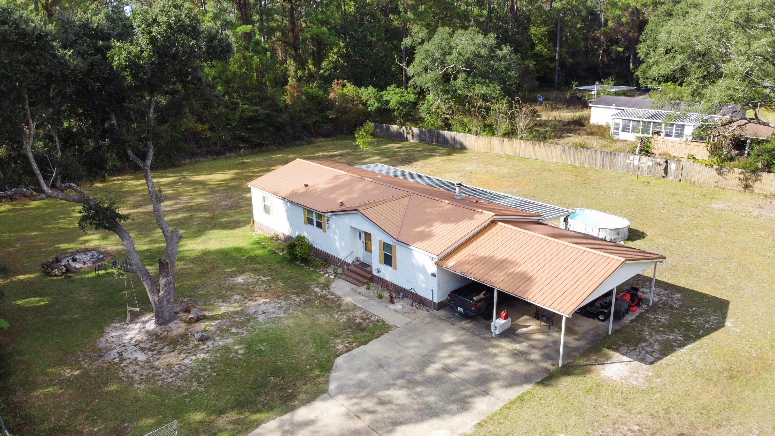 7478 Rose Street Navarre, FL 32566 - Photo 56 of 60 dji_fly_20251113_131430_574_176306135603