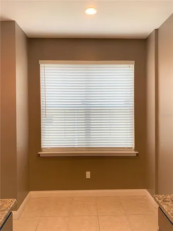 a view of a room with a window