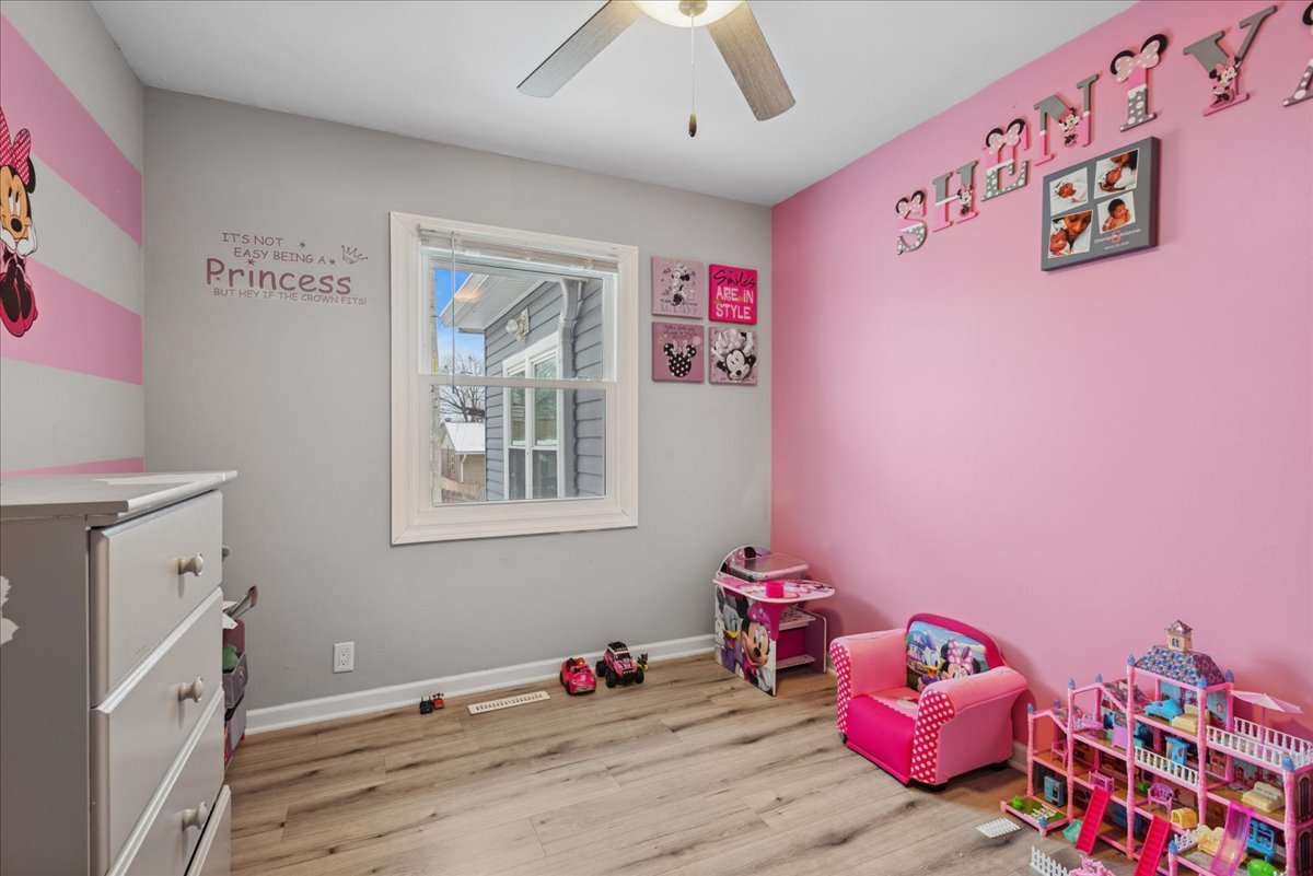 128 McCabe Drive Streamwood, IL 60107 - Photo 11 of 19 a bedroom with furniture and a baby crib