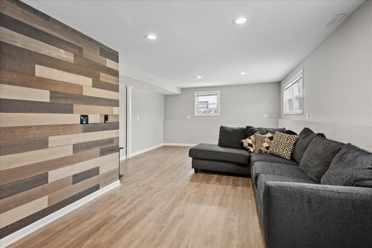 128 McCabe Drive Streamwood, IL 60107 - Photo 14 of 19 a living room with furniture and a wooden floor