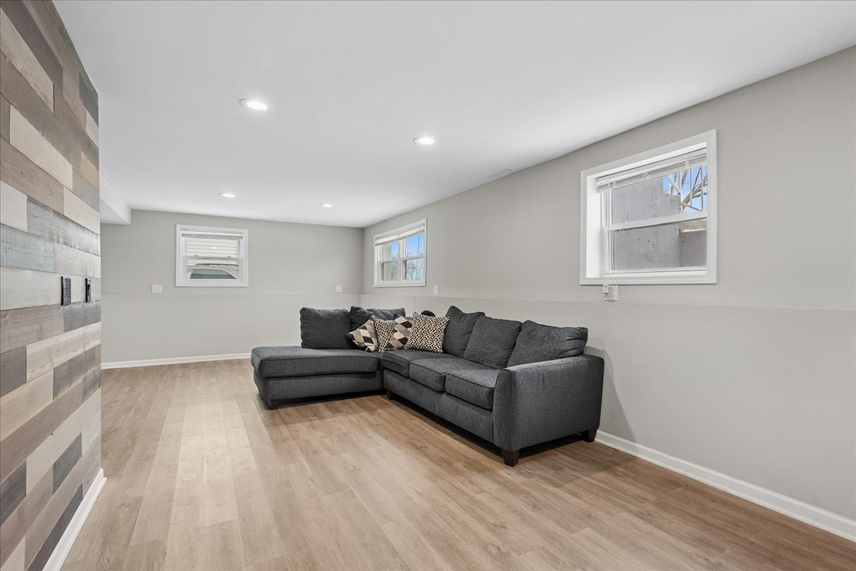 128 McCabe Drive Streamwood, IL 60107 - Photo 15 of 19 a living room with furniture and a wooden floor