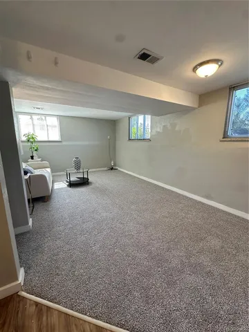 a view of a livingroom and a window