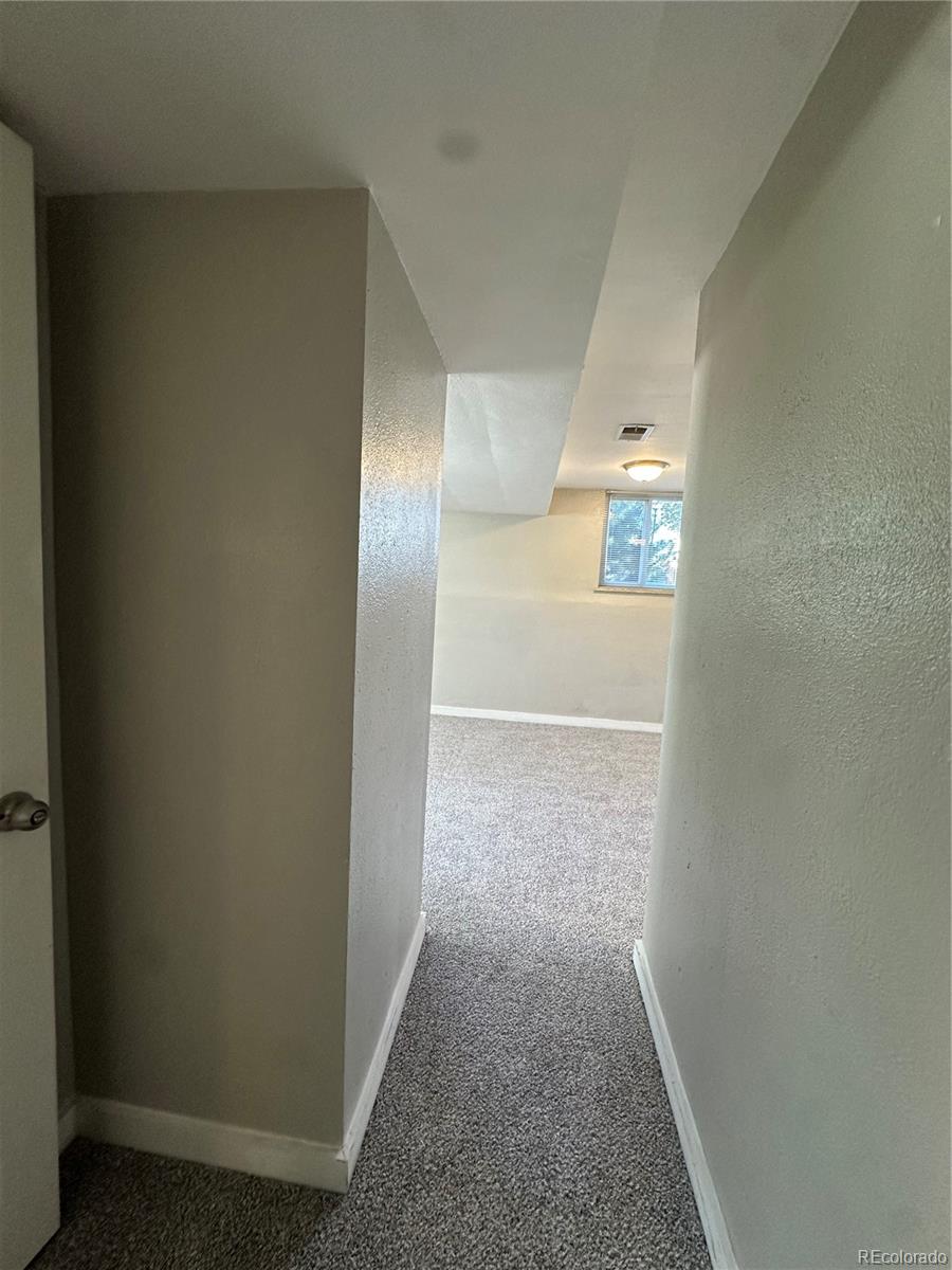 1400 South Clermont Street, Unit 7 Denver, CO 80222 - Photo 17 of 20 a view of a hallway