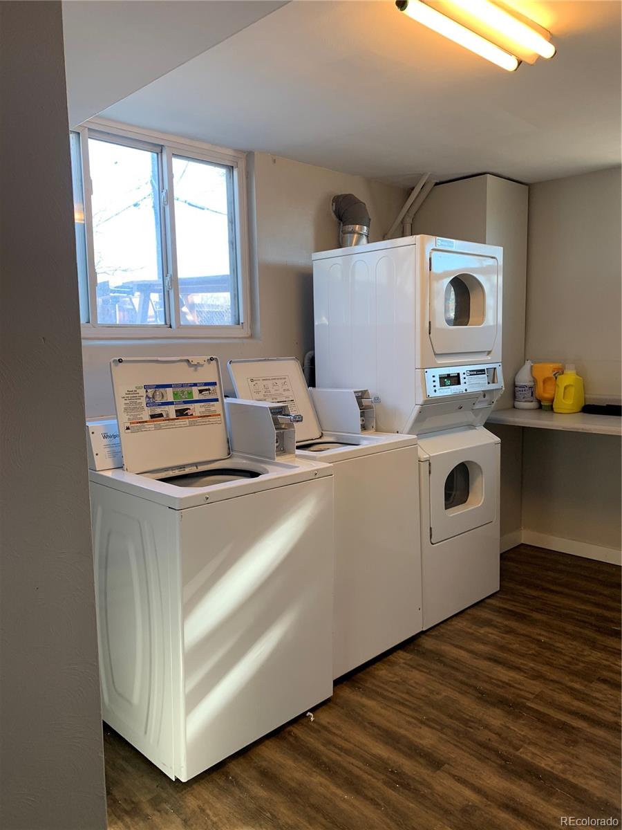 1400 South Clermont Street, Unit 7 Denver, CO 80222 - Photo 19 of 20 a kitchen with a stove a sink and a microwave