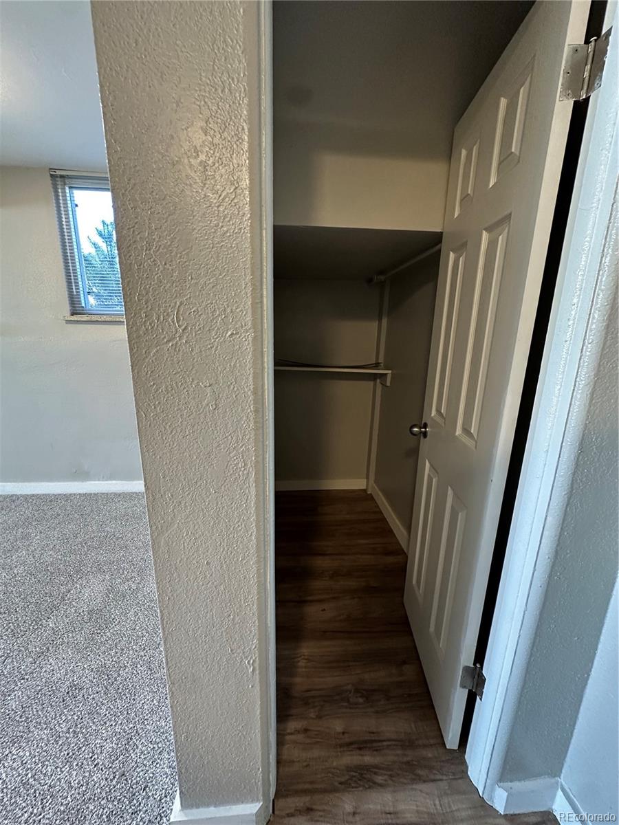 1400 South Clermont Street, Unit 7 Denver, CO 80222 - Photo 4 of 20 a view of staircase with wooden floor and staircase