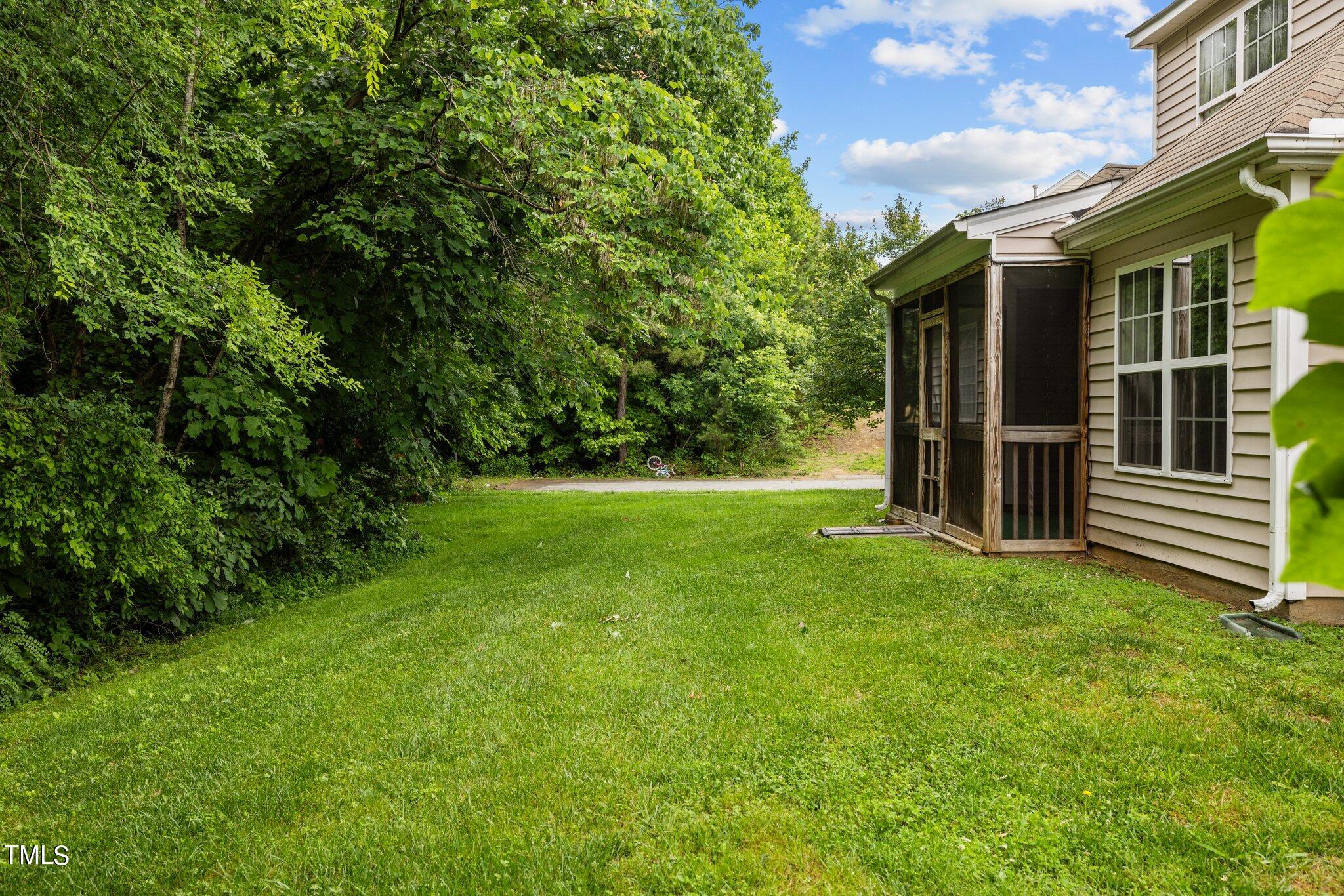 917 Golden Crest Drive Durham, NC 27704 - Photo 20 of 25 Backyard side View