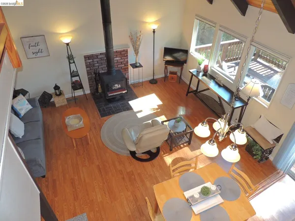 a close view of living room with furniture and a fireplace