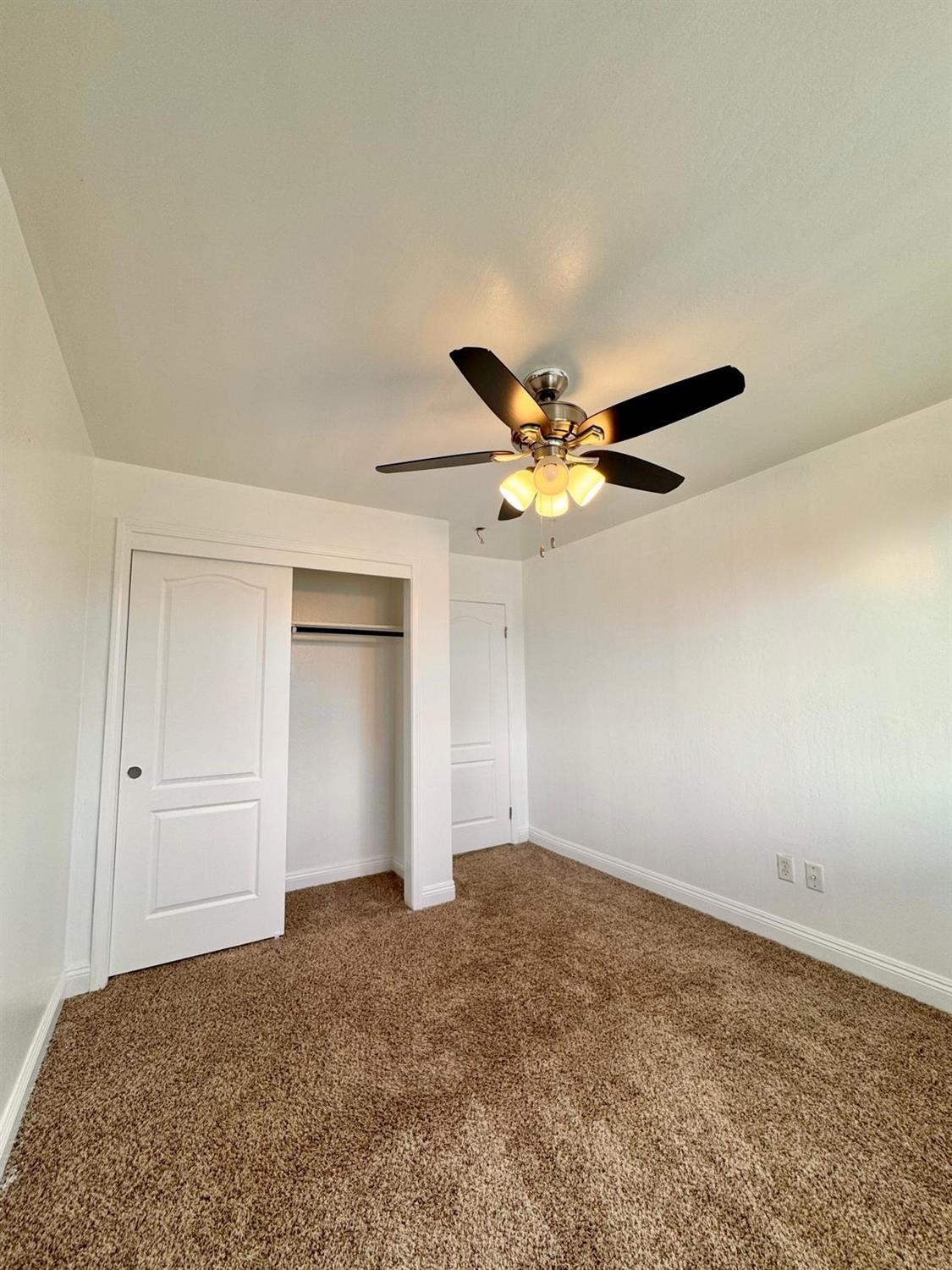 7111 Santana Sun Drive Bakersfield, CA 93313 - Photo 4 of 13 a view of an empty room