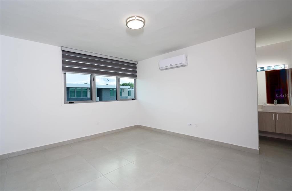 71 Ace Bayamon, PR 00959 - Photo 11 of 19 an empty room with windows