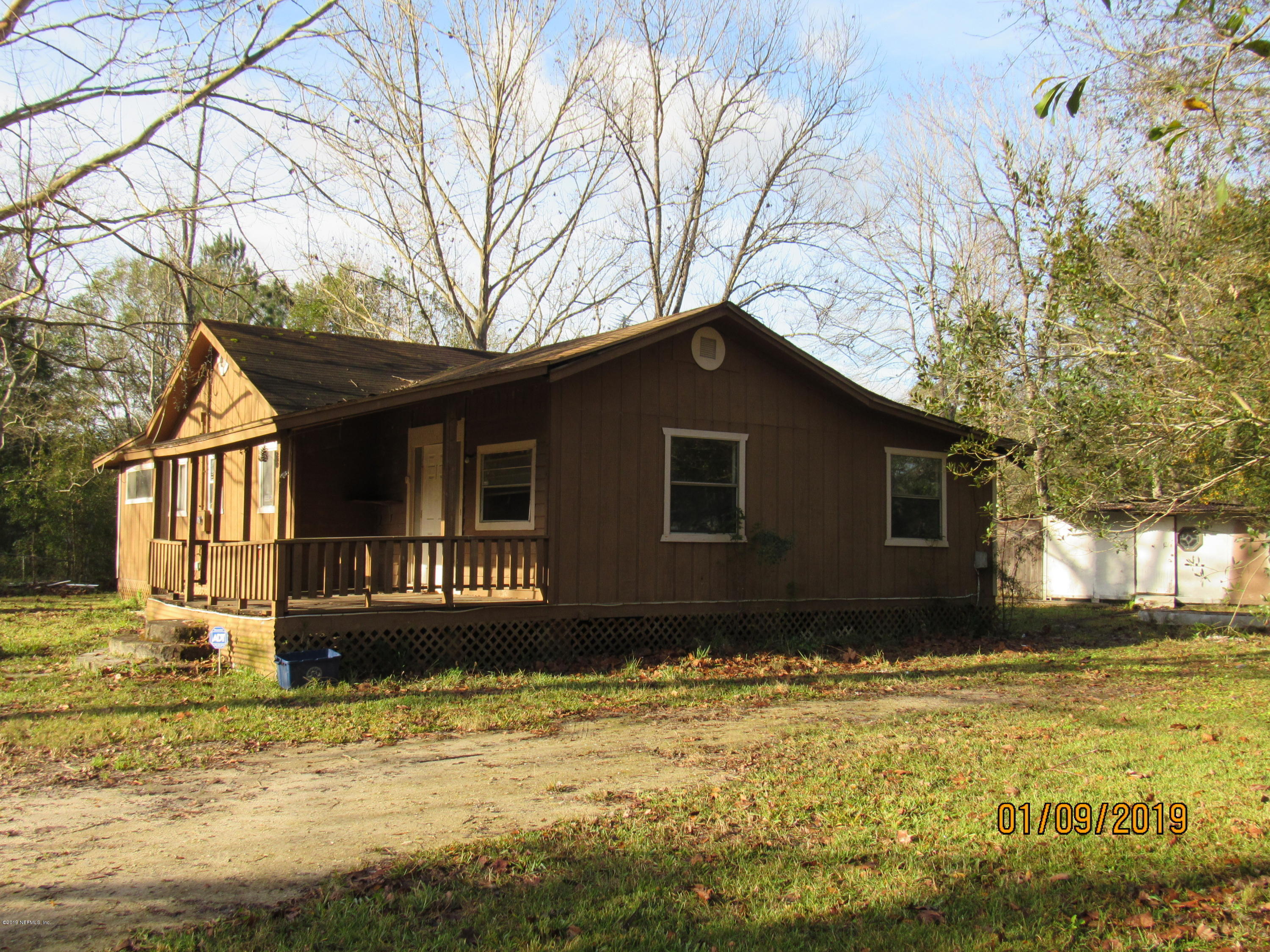 1578 Baxley Road Middleburg, FL 32068 - Photo 6 of 9 a front view of a house with a yard