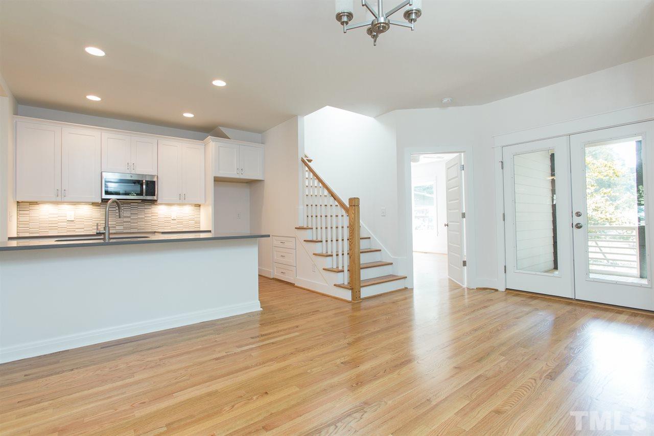5316 Russell Road Durham, NC 27712 - Photo 10 of 25 a view of kitchen with furniture and wooden floor