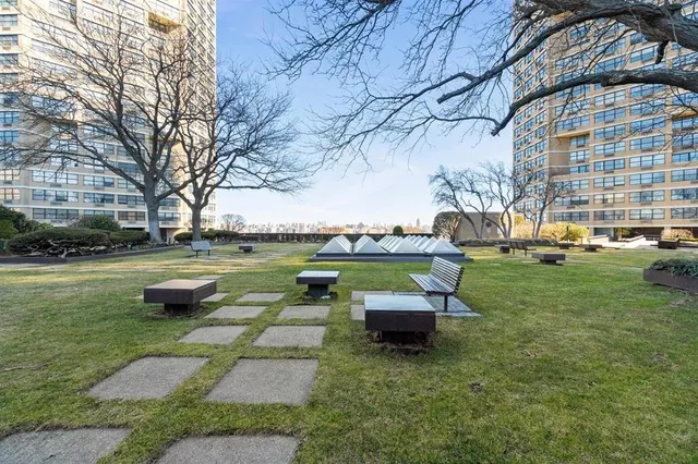 a view of a garden with houses