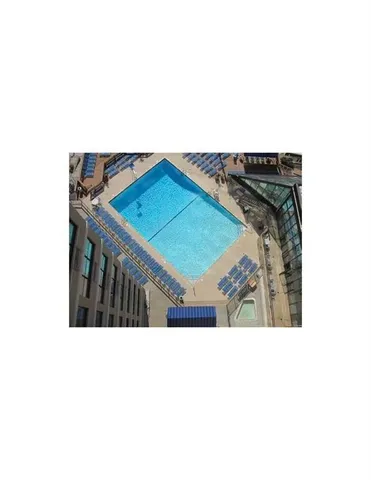 a view of multiple houses with yard